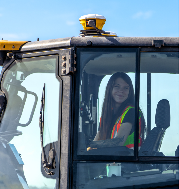 HBC, close up, female employee smiling operating truck, opportunity-at-hbc.png, Careers